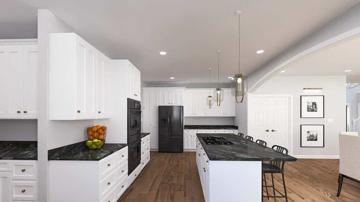 The kitchen includes black appliances and a walk-in pantry.