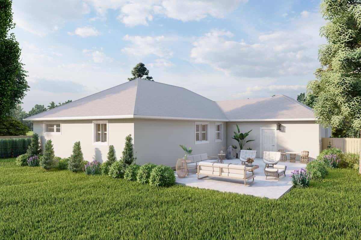 Rear view with hipped rooflines and an open patio.