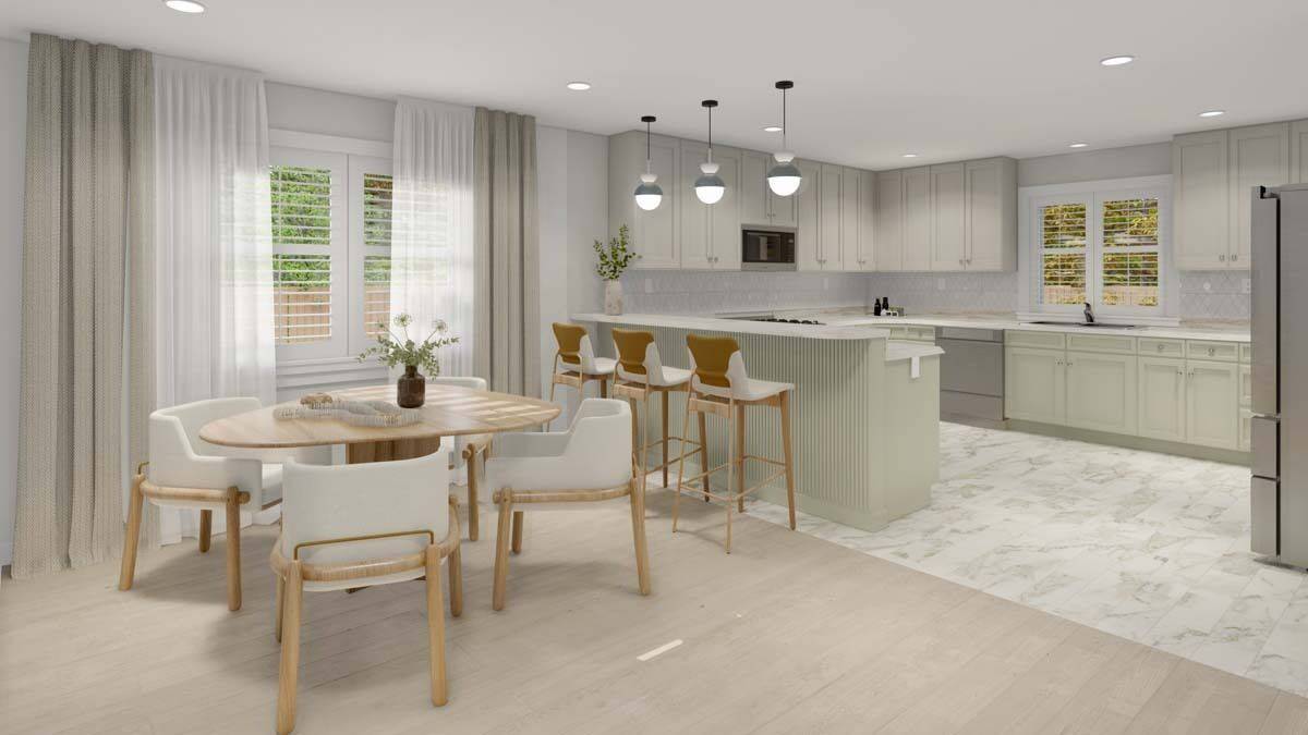 Dining area with a wooden dining table surrounded by contemporary chairs.