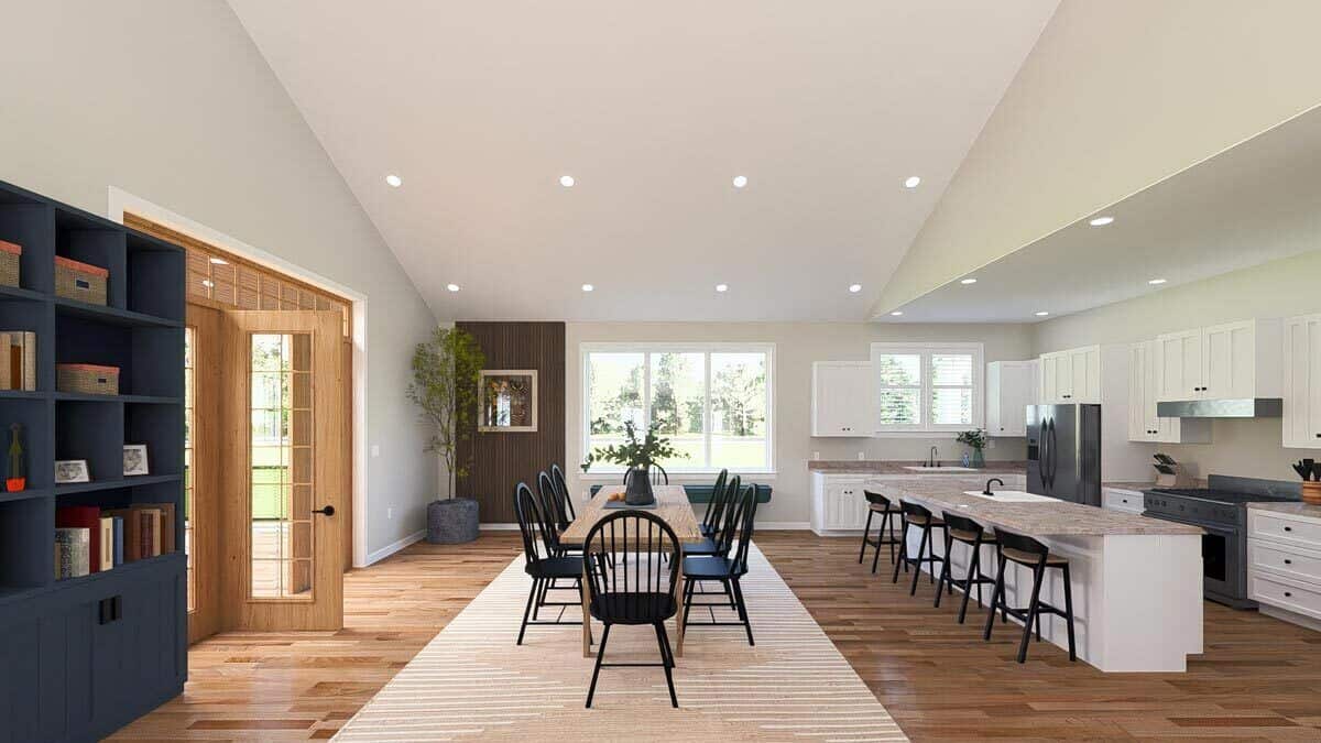 Dining room with a wooden dining set over a beige area rug.