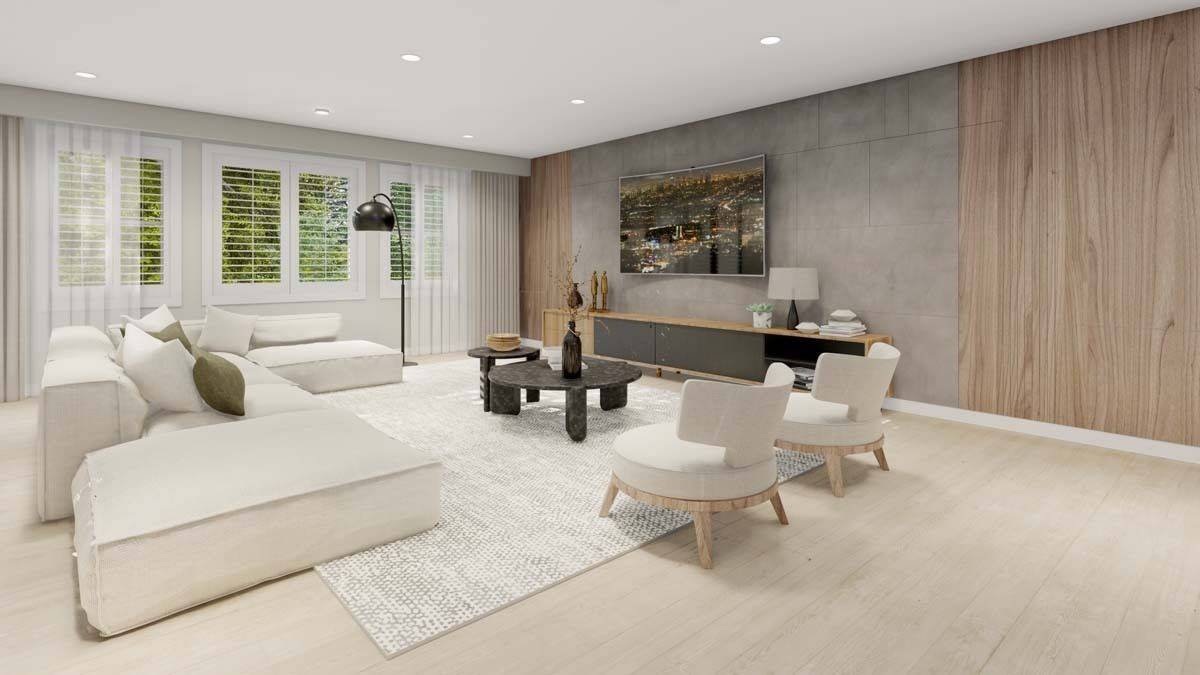 Family room with an L-shaped sofa, round back chairs, and a TV mounted above the console table.