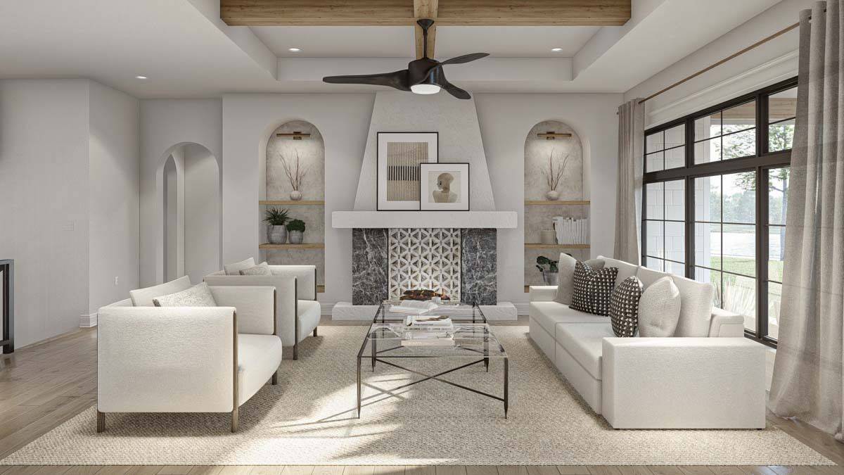 Great room with modern sofas, glass-top tables, a fireplace, and a tray ceiling accentuated with exposed beams.