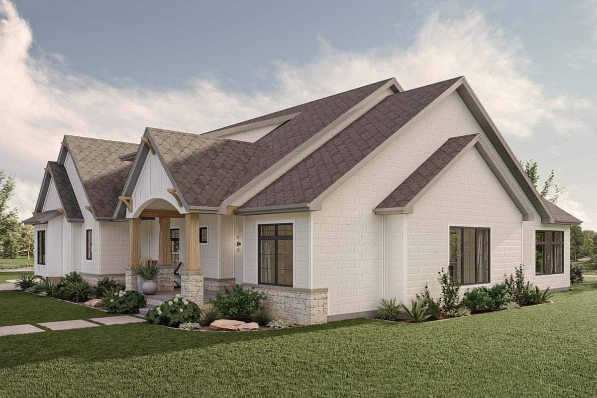 Front-right view with a covered entry porch and stacked gables.