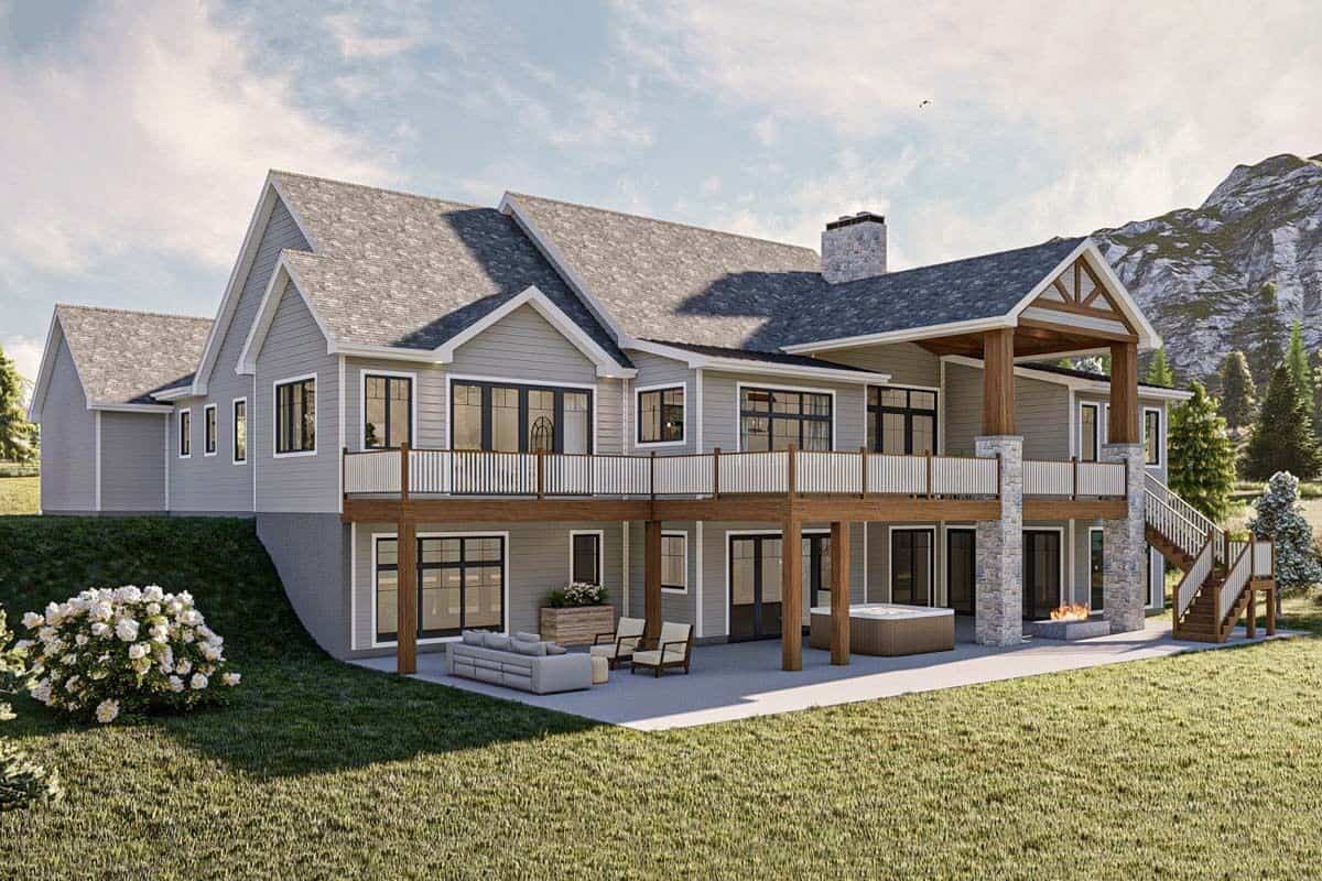Rear-right view with multiple gables and expansive decks.