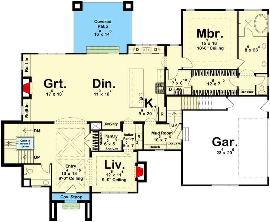Main level floor plan of a transitional style two-story 4-bedroom home with foyer, living room, great room, dining area, kitchen, primary suite, and mudroom leading to the garage.