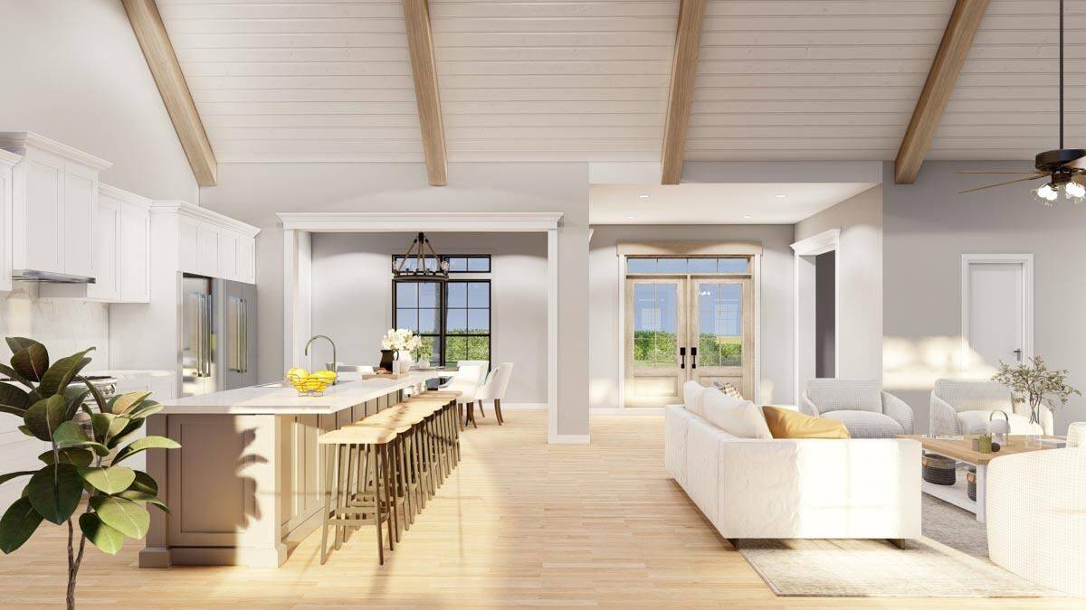 An open layout view of the kitchen, great room, and dining room.