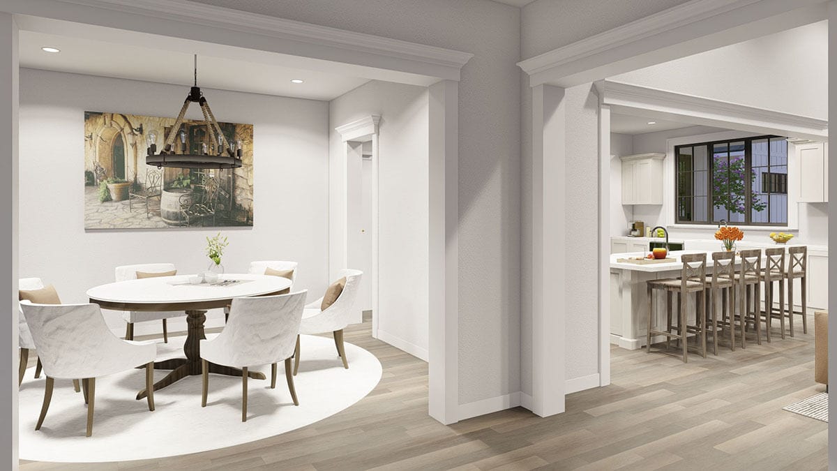 Dining room with a round dining set over a round area rug.