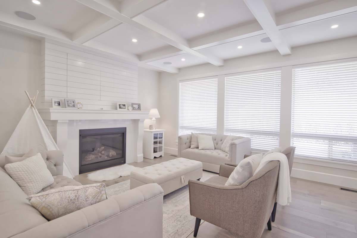 A trio of windows fills the great room with natural light.