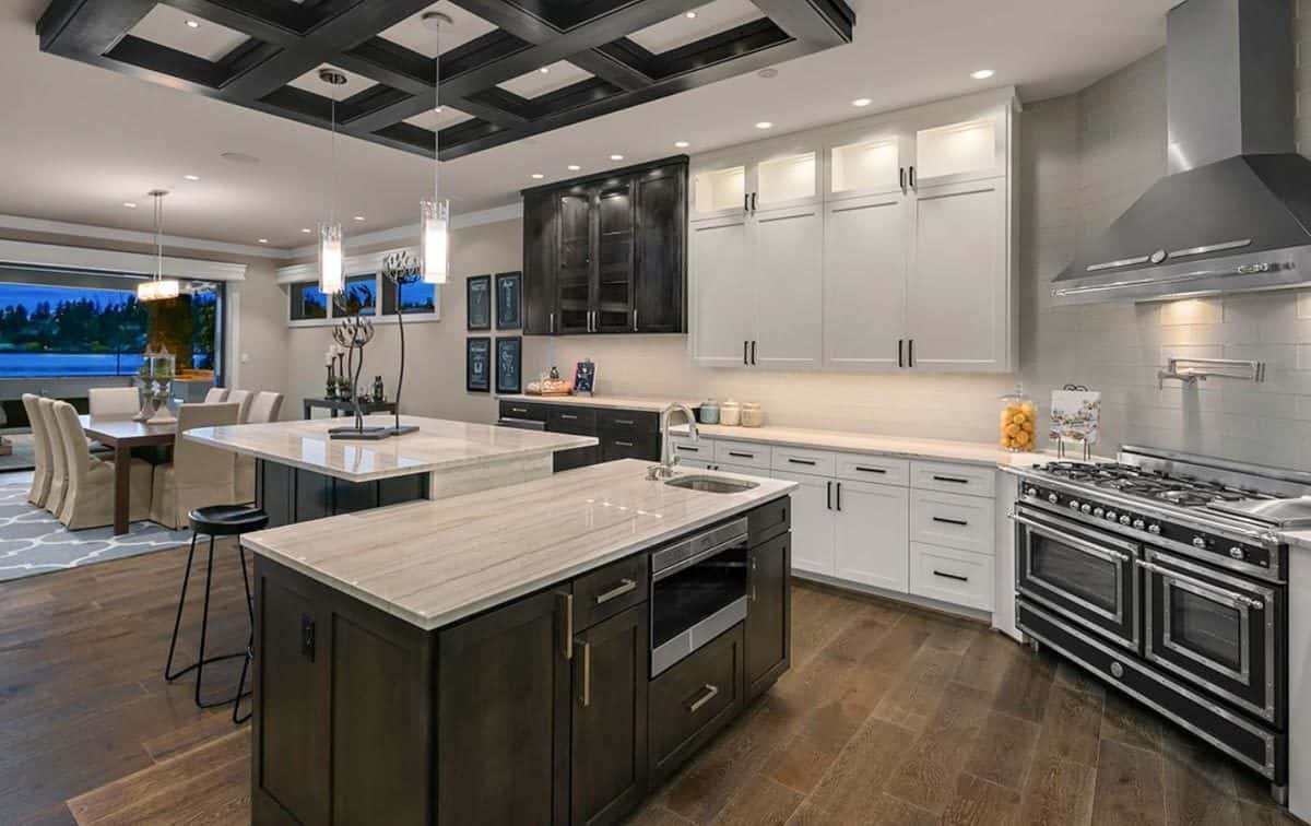 Kitchen island with a raised eating counter overlooking the dining room.