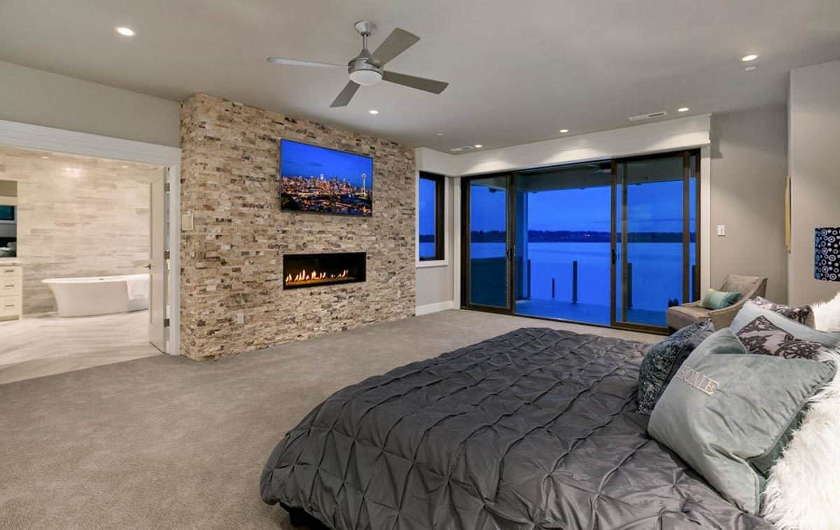 The primary bedroom includes an ensuite bath and a private deck.