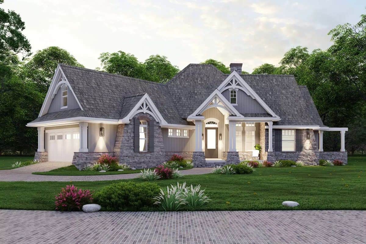Front view of the house with a covered entry porch and an angled garage.