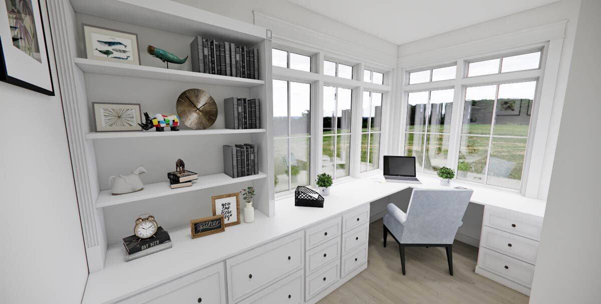 Office with built-in desk and cabinets.