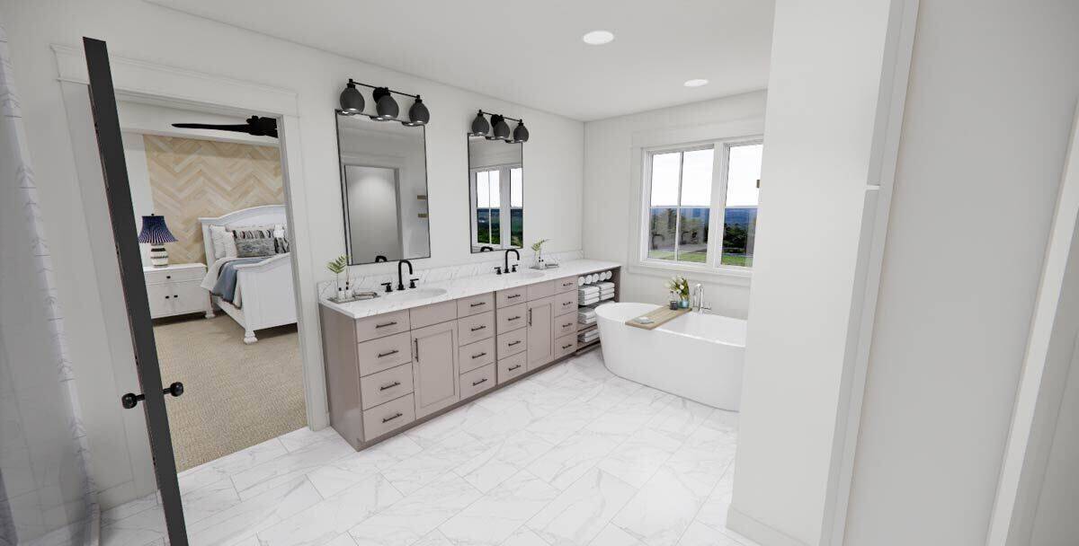 White-framed windows above the bathtub fill the primary bathroom with natural light.