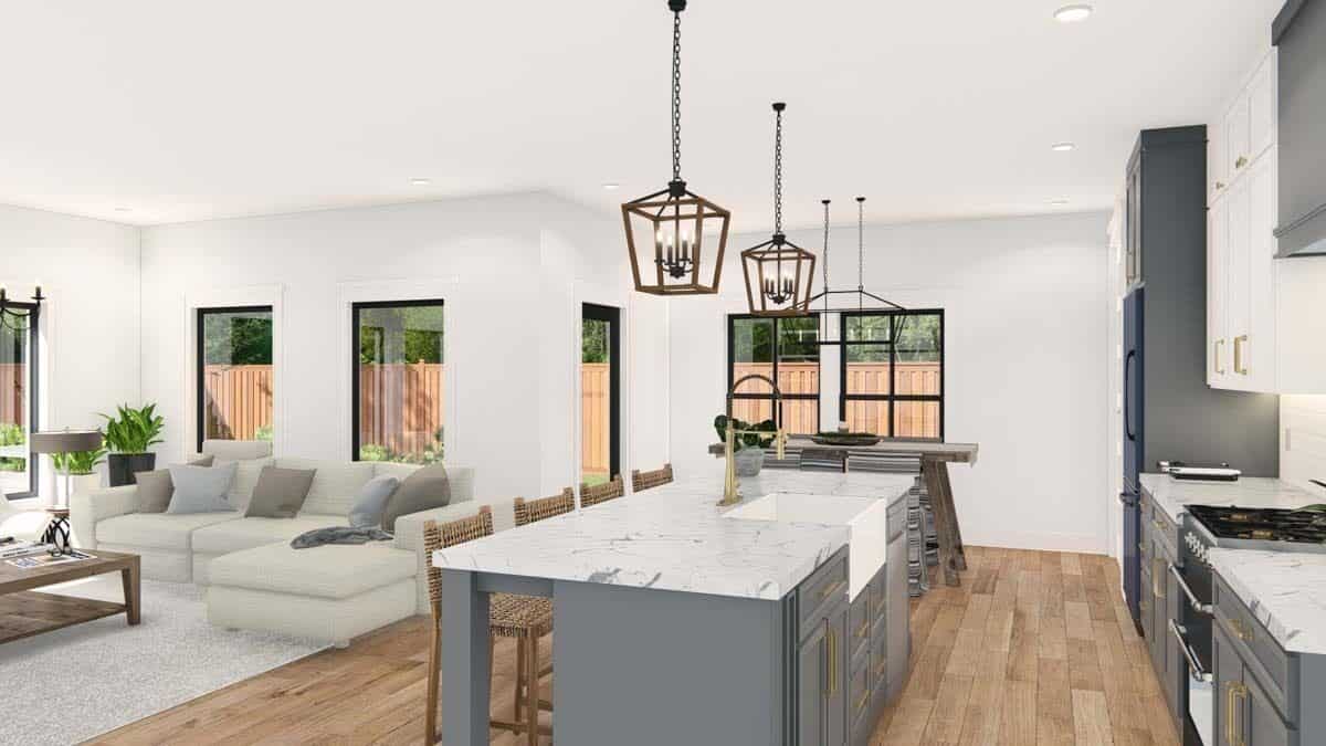 Kitchen island with a farmhouse sink overlooking the great room.