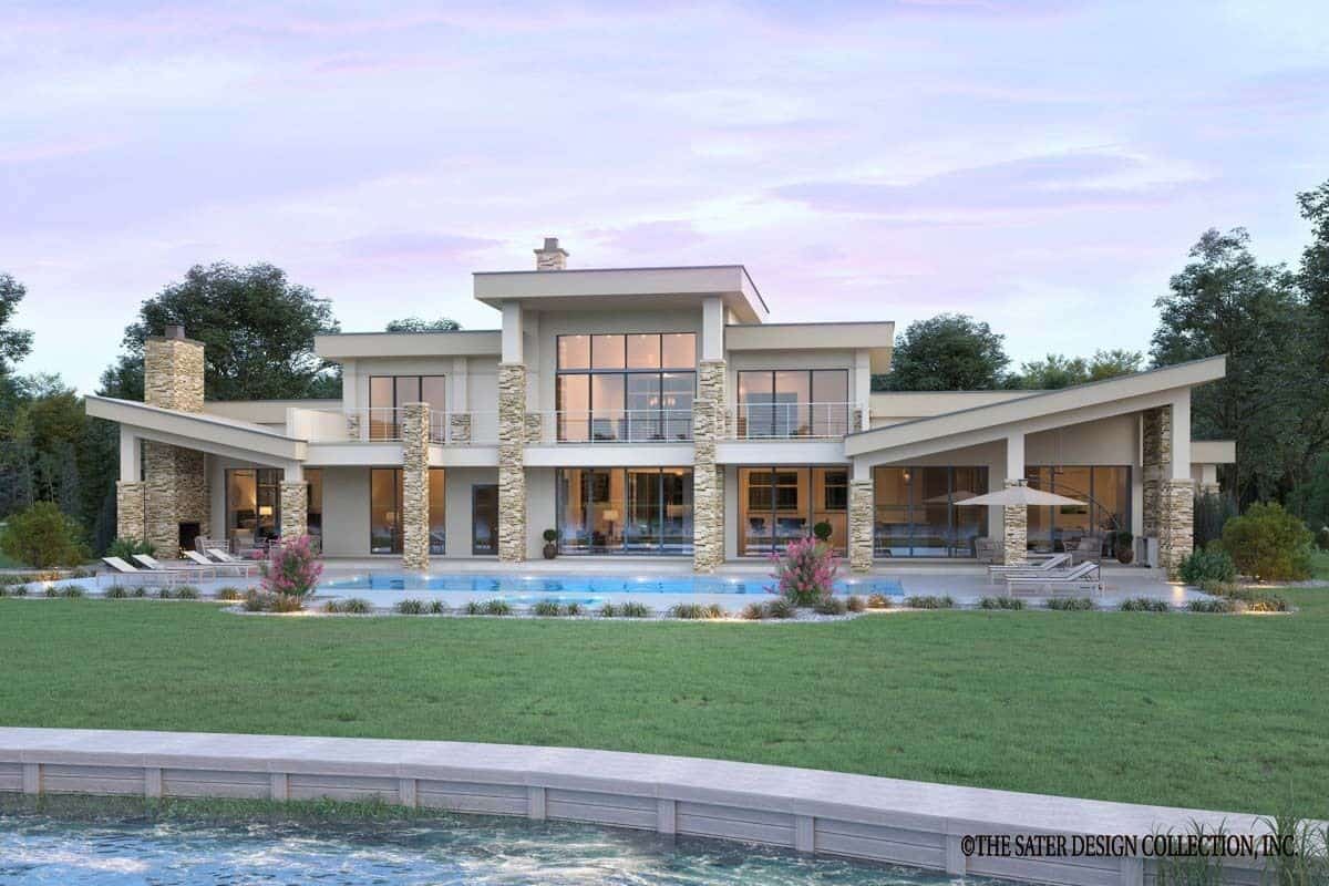 Rear view of the house showcasing the expansive patio and swimming pool.