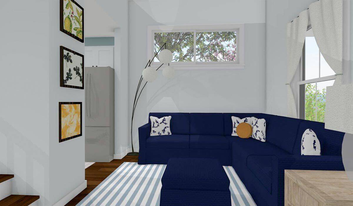 Living room with an L-shaped sectional and a matching ottoman over the striped area rug.