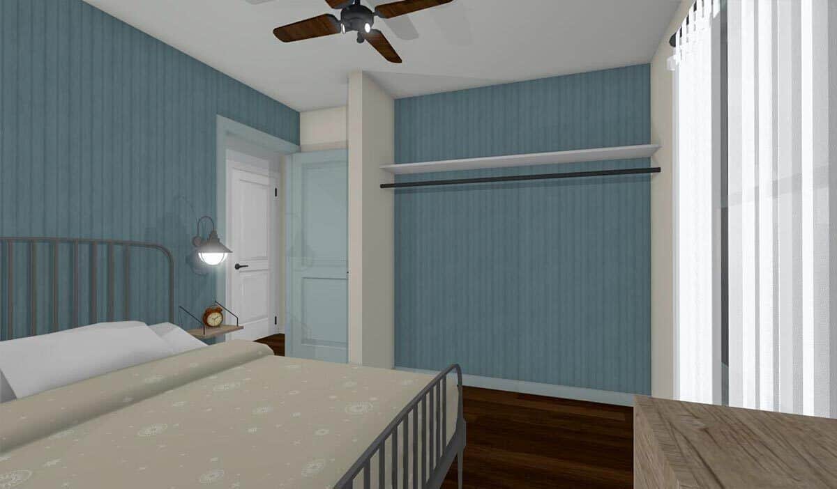 The bedroom includes a floating shelf with a hanger rod beneath for storing clothes.