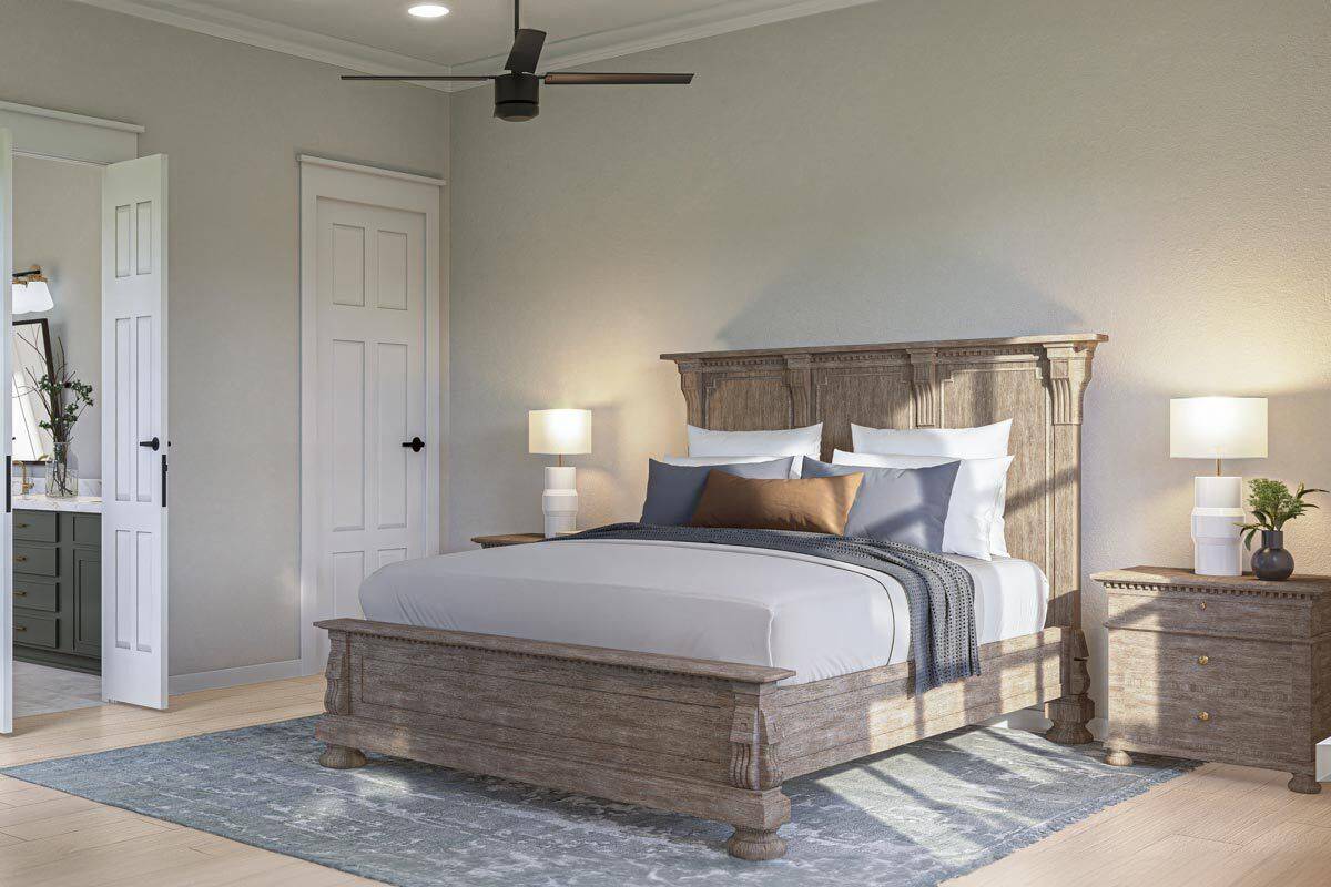 Primary bedroom with an ensuite bath and a rustic bed flanked by matching nightstands.