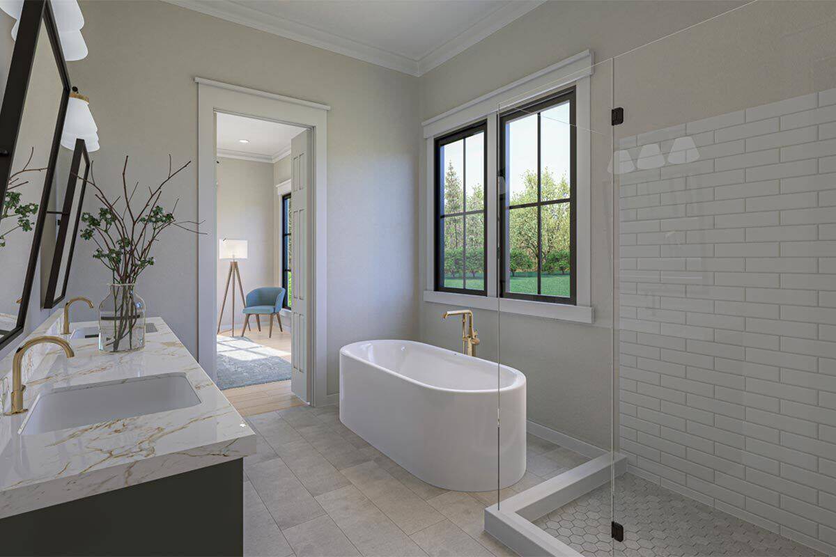 Primary bathroom with a dual sink vanity, a walk-in shower, and a soaking tub under the framed windows.