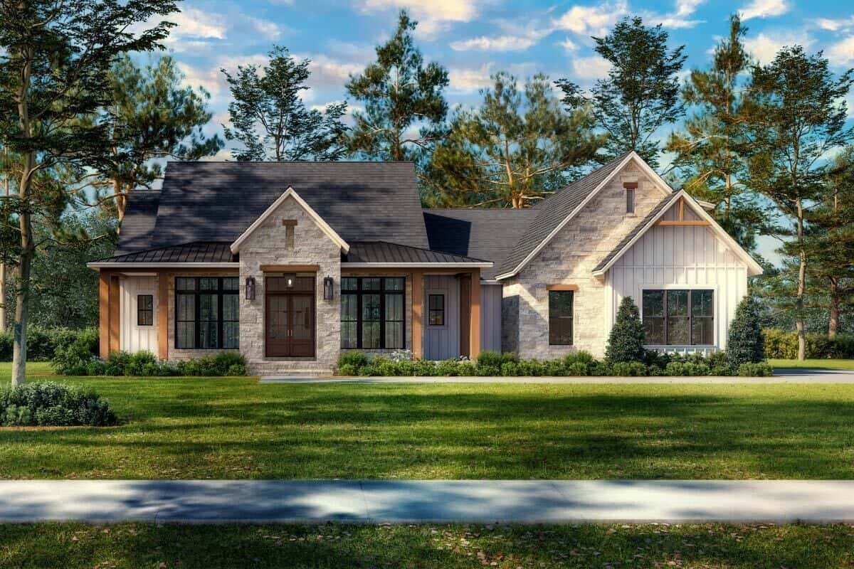 Front view with gable rooflines and a wraparound front porch framed with wooden posts.