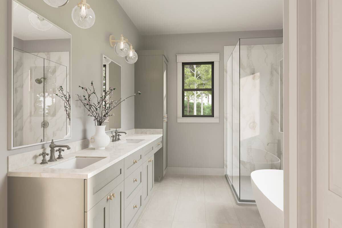 Primary bathroom with a dual sink vanity, a walk-in shower, and a freestanding tub.