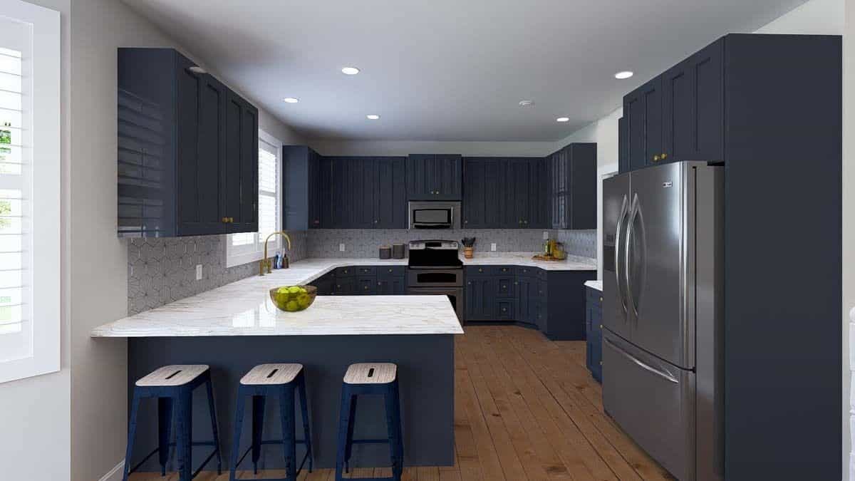 Kitchen with deep blue cabinets, high-end appliances, and a peninsula bar with seating for three.