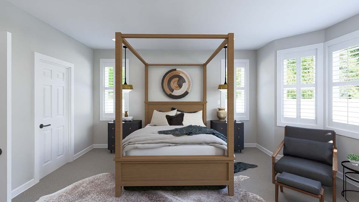 Louvered windows bring natural light into the primary bedroom.