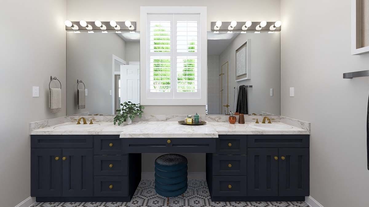 Primary vanity with two sinks and a makeup counter in the middle.