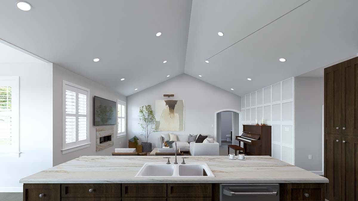 Kitchen island with double sinks overlooking the family room.