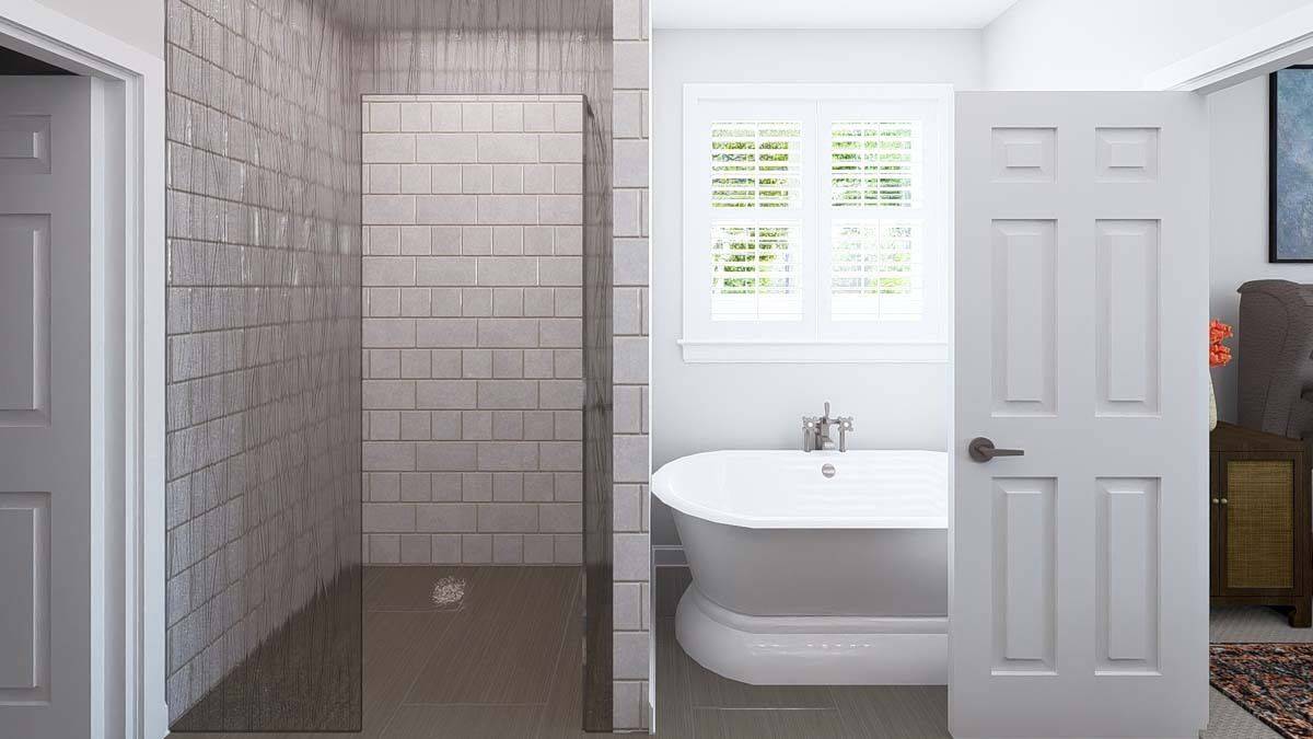 The primary bathroom includes a tiled shower and a freestanding tub.