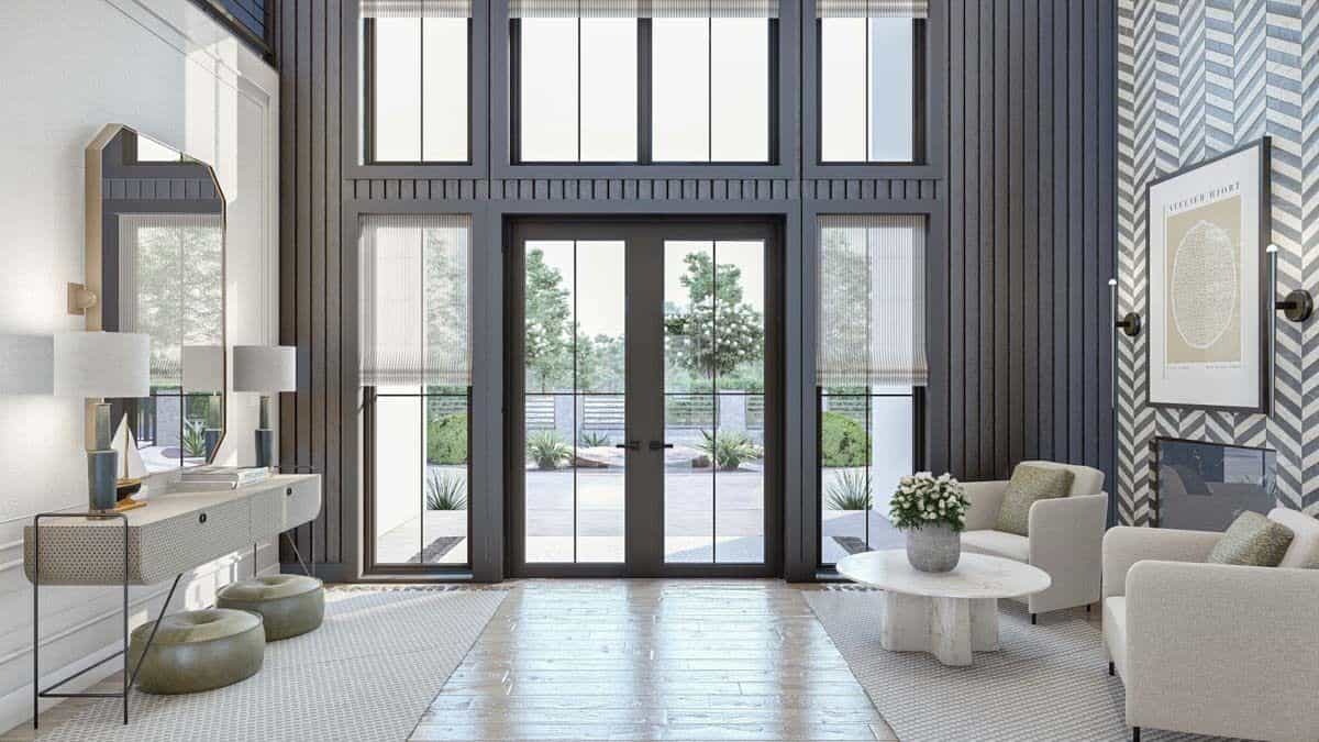 The foyer includes a French front door and a metal console table adorned with an octagonal mirror.