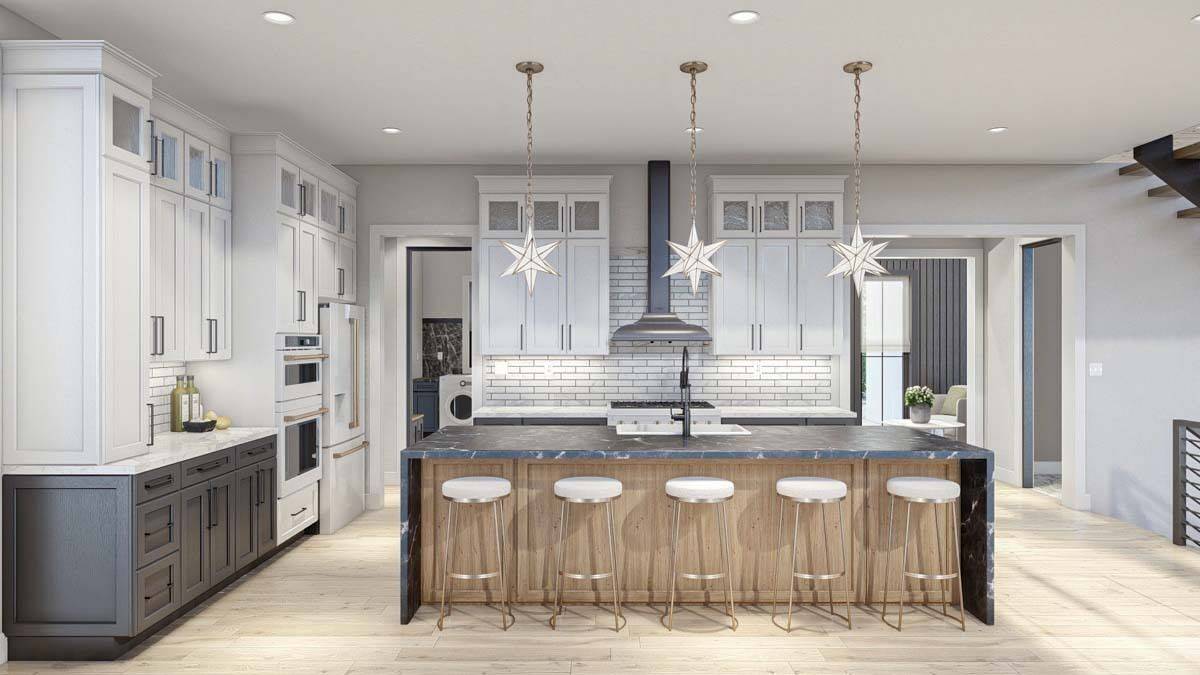 Kitchen with contrasting cabinets, white appliances, and a waterfall island lined with five bar stools.