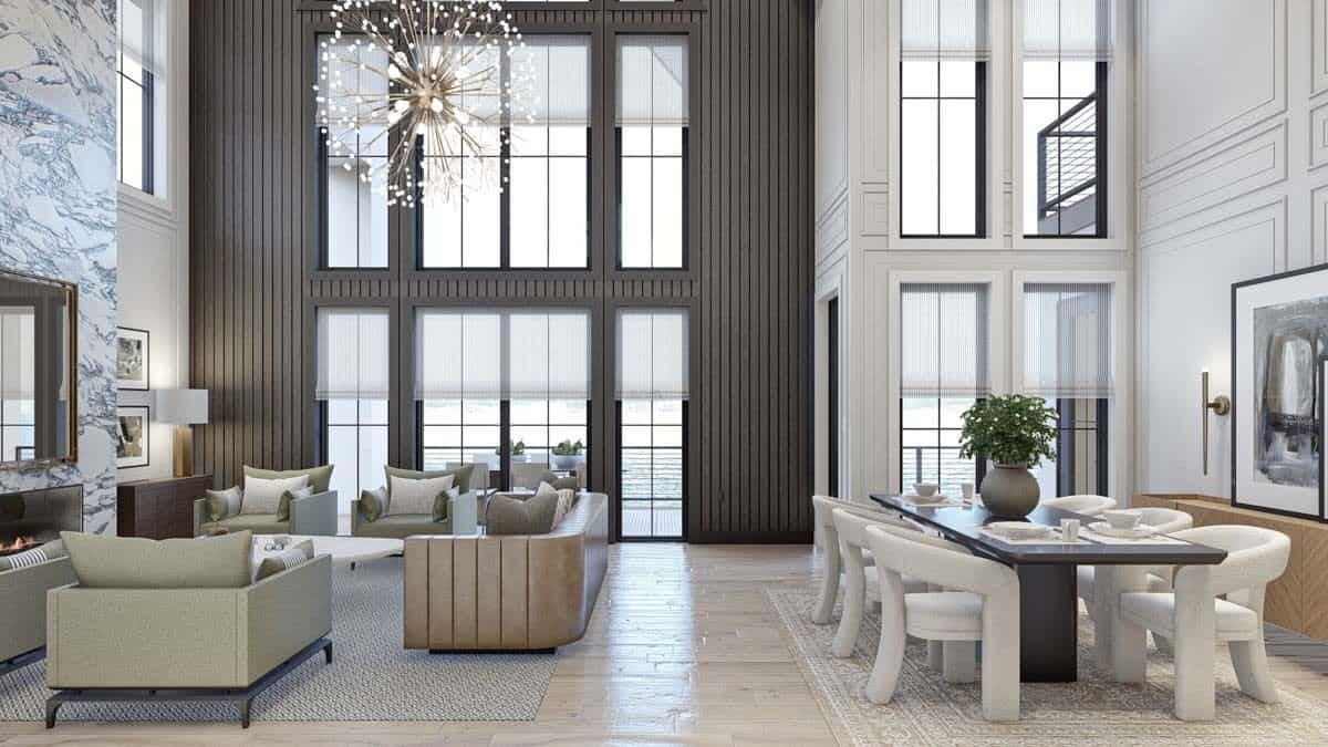 Great room and dining area illuminated by a wall of windows.