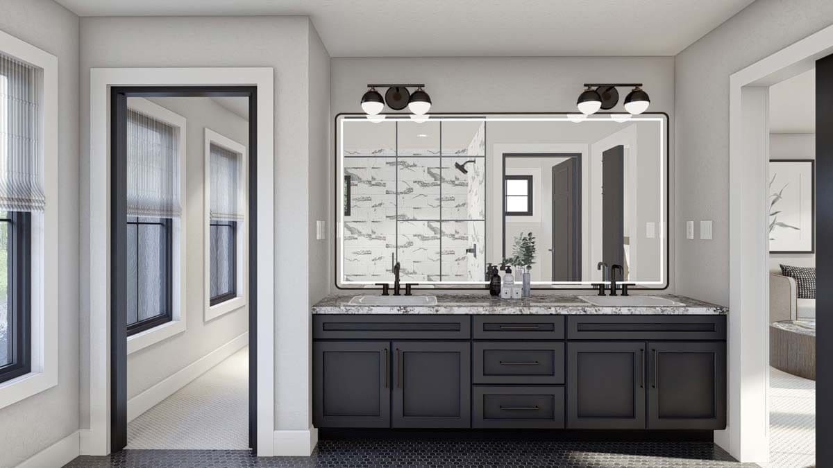 Bathroom with a large vanity equipped with two sinks, a marble countertop, and a rectangular mirror.