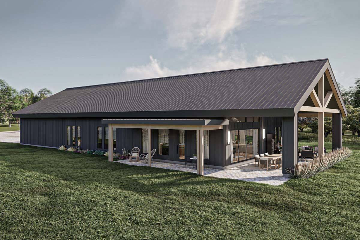 Rear-left view with covered porches and huge windows.