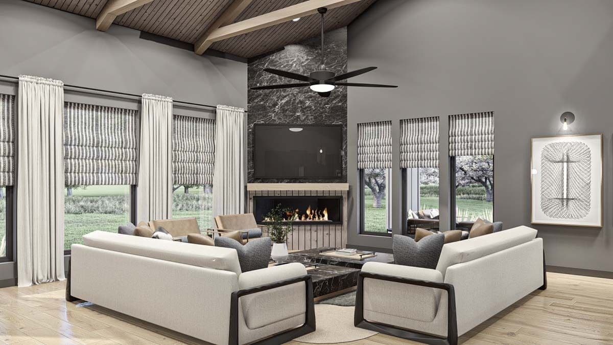 Windows on two sides of the wall bring natural light into the great room.