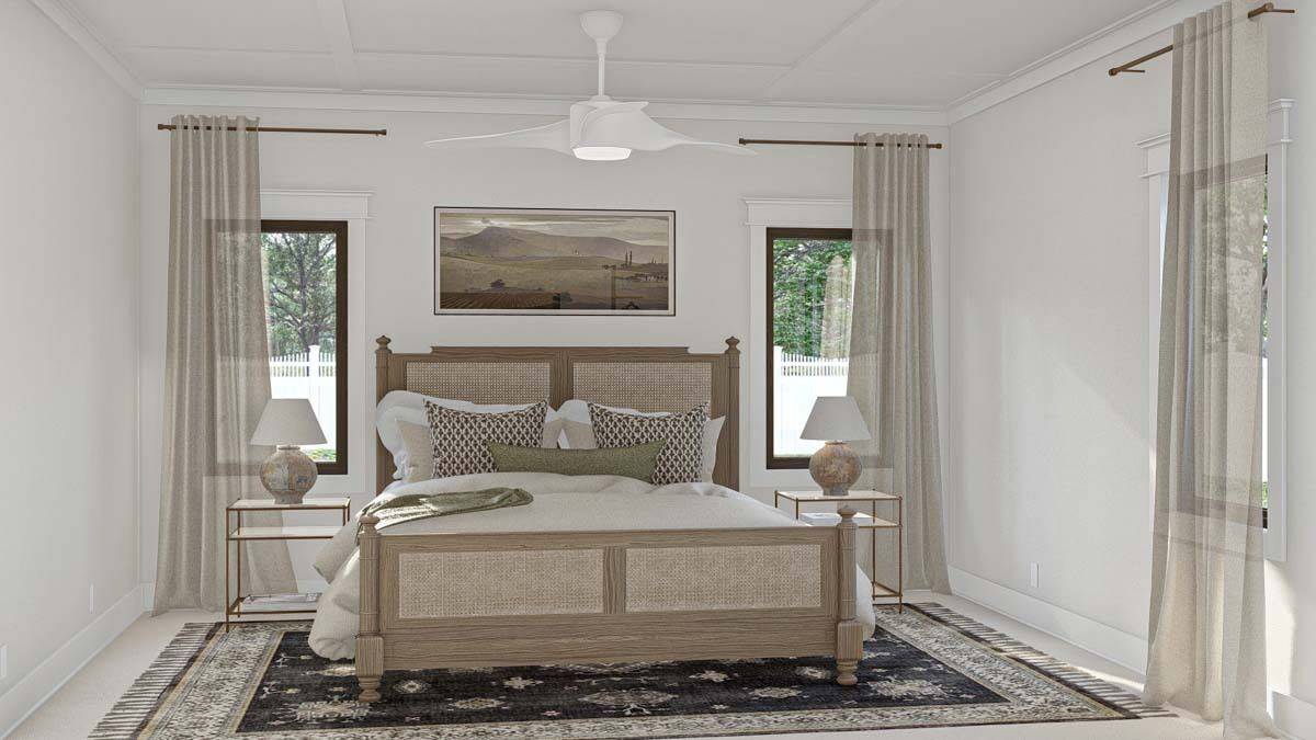 Sleek windows bring natural light into the primary bedroom.
