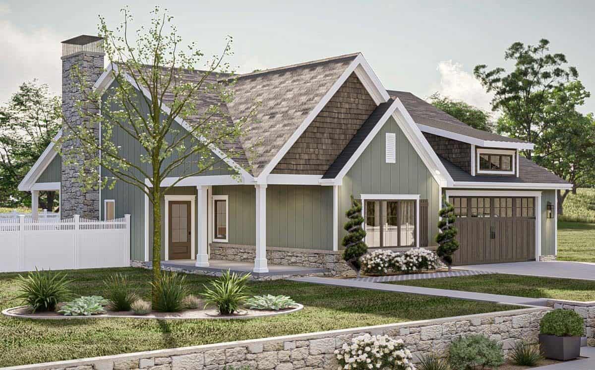 Front-left view with a covered porch and a double garage topped with a shed dormer.