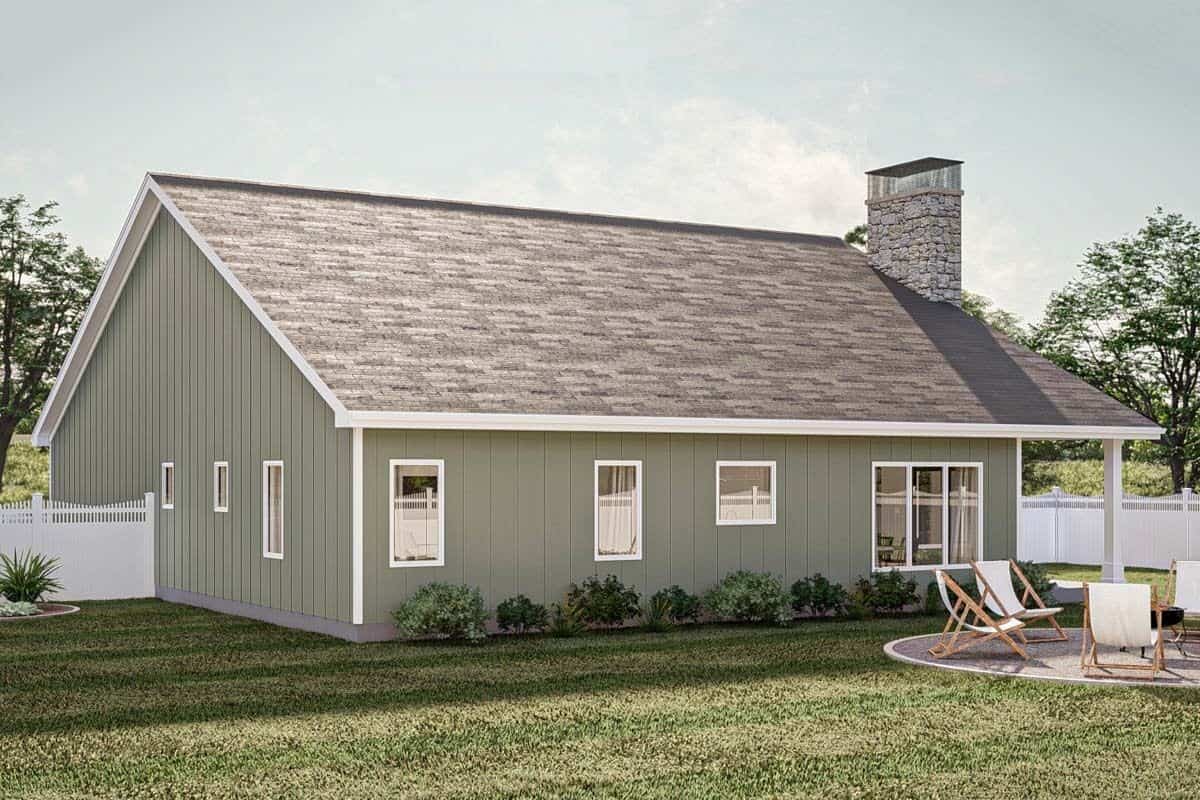Rear-left view with white-framed windows and a concrete patio.