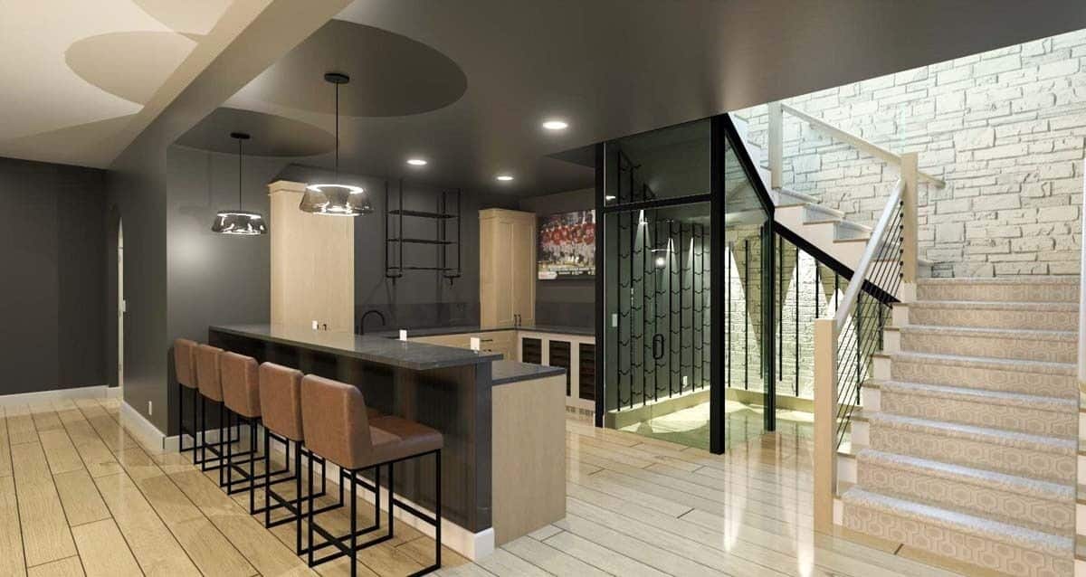 Wet bar with wooden cabinets, marble countertops. and a raised eating counter.