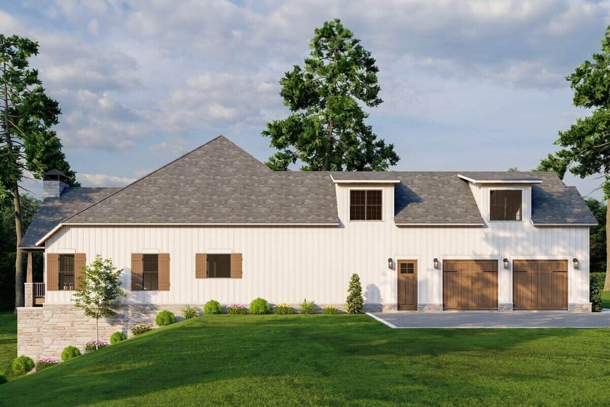 Left view with a double garage topped with twin shed dormers.
