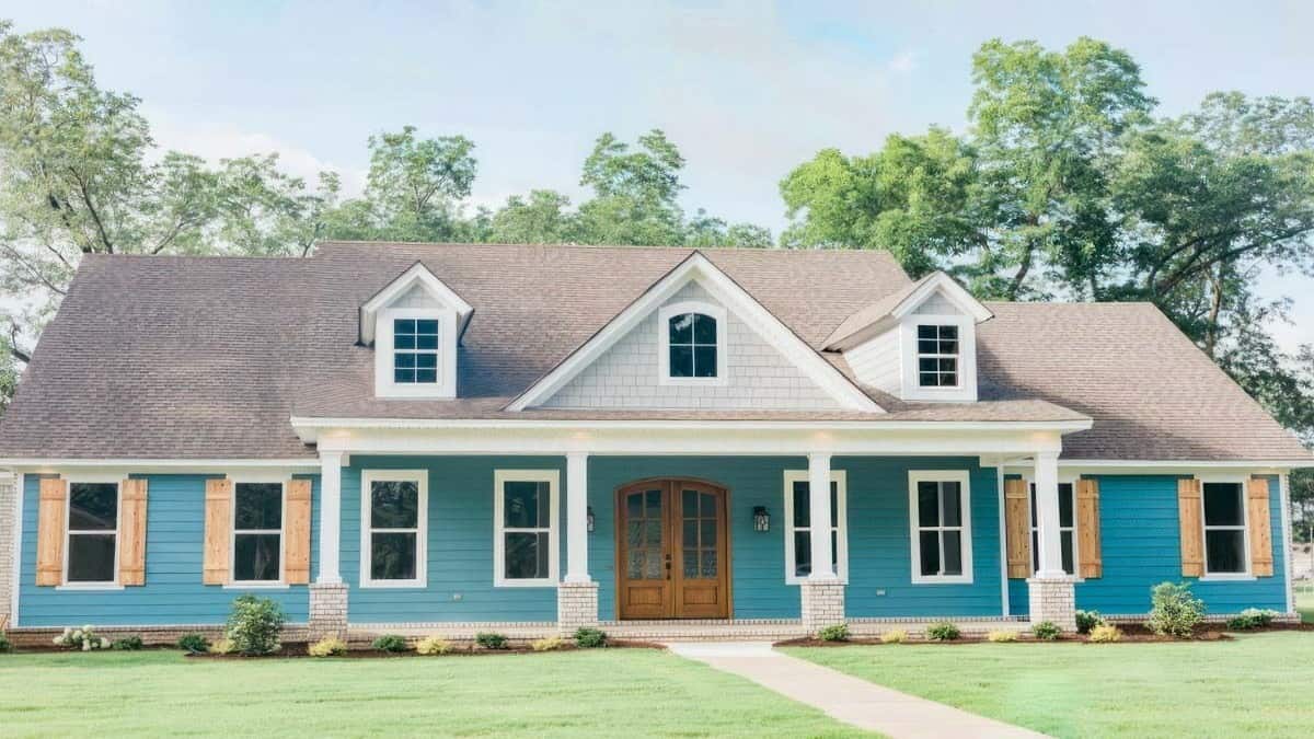 Country Style 4-Bedroom Single-Story Home with Open Living Space and 2-Car Rear-Access Garage