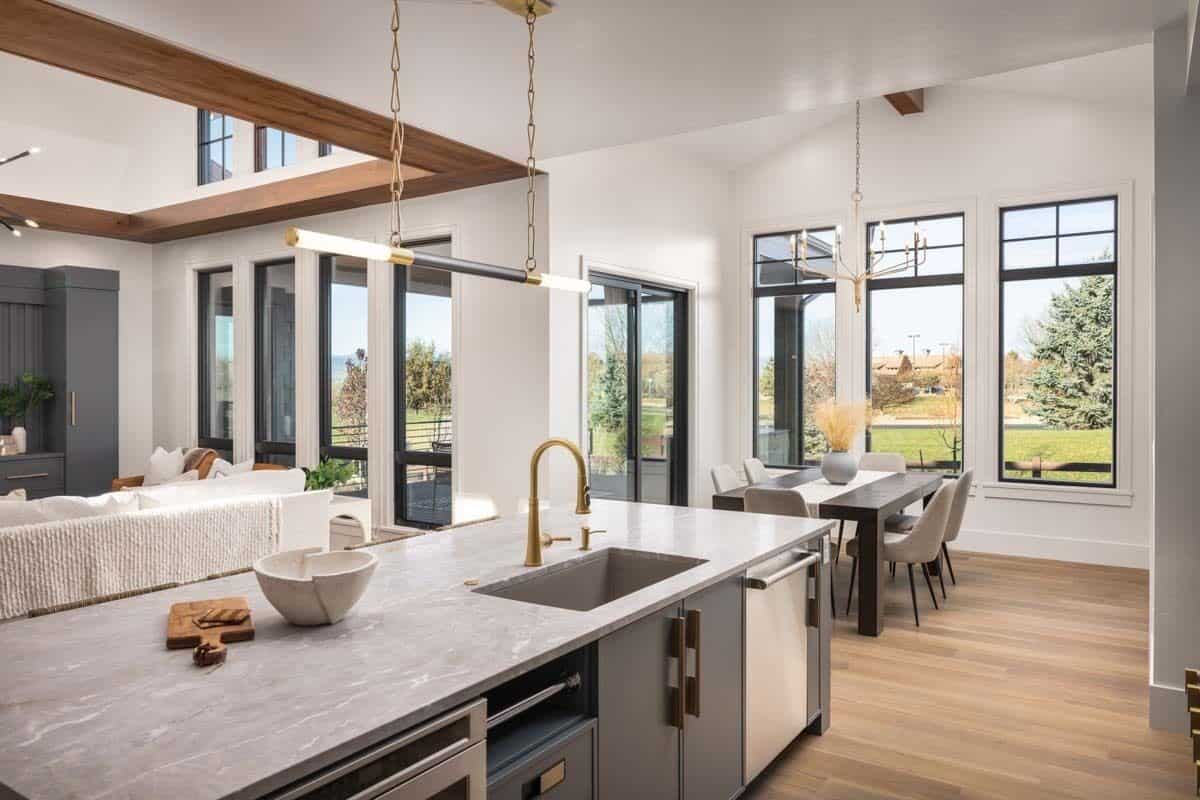 View of the great room and dining area from the kitchen.