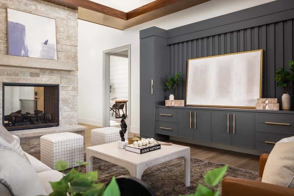 A white coffee table over the vintage area rug completes the great room.