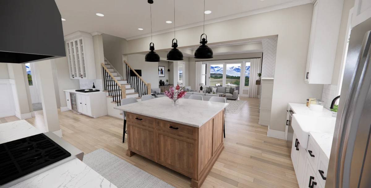 The kitchen includes a farmhouse sink and black pendants suspended over the island.