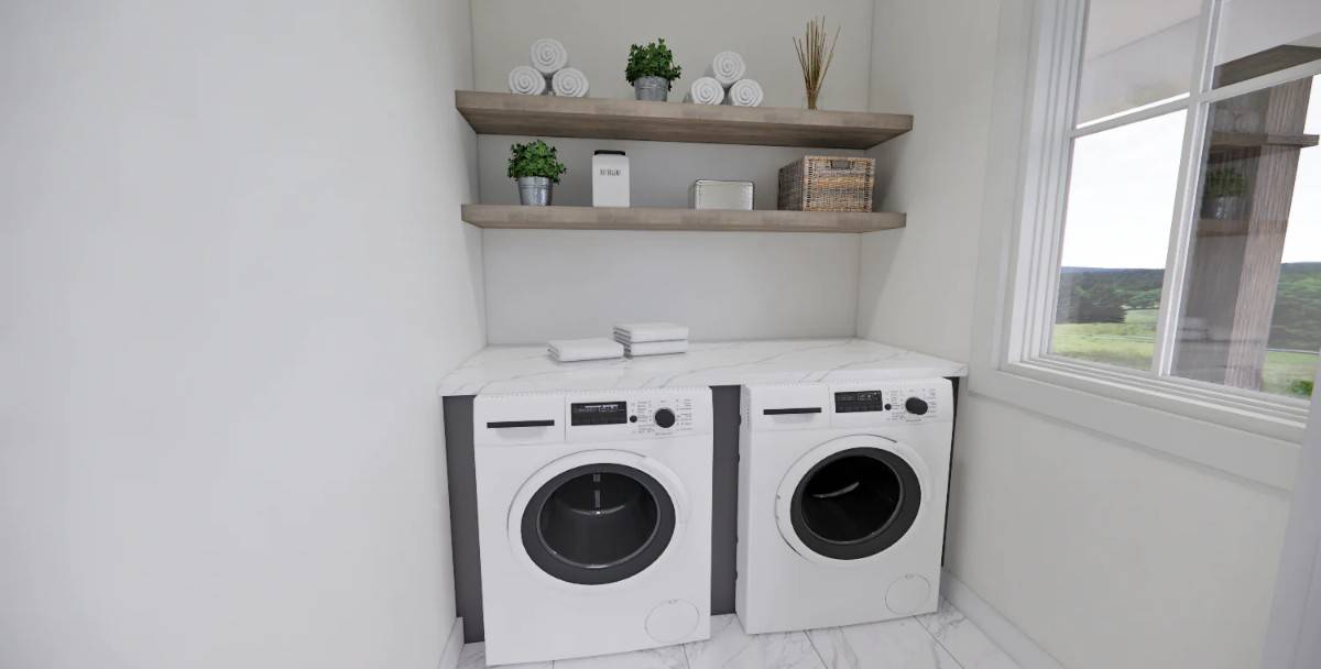 Laundry room with floating shelves, a marble countertop, and a large window that allows natural light in.