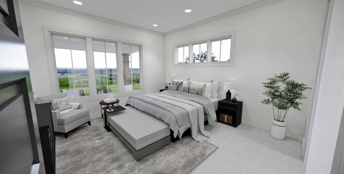 Primary bedroom with a cushioned chair and a matching bed complemented with a large bench.