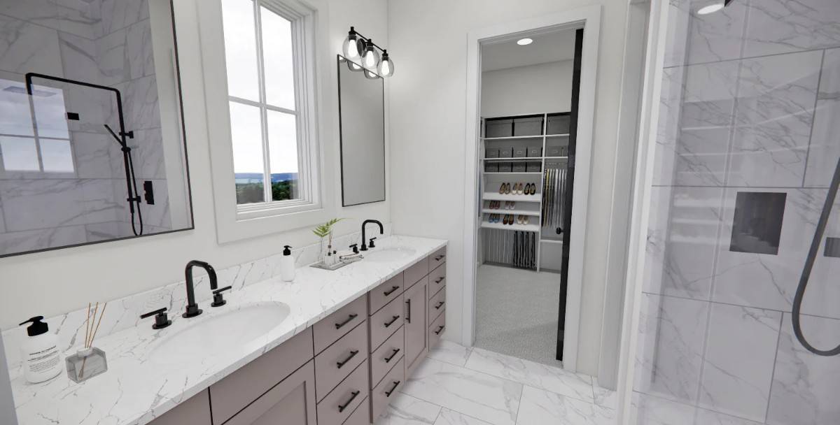 Primary bathroom with a dual sink vanity and a walk-in shower.