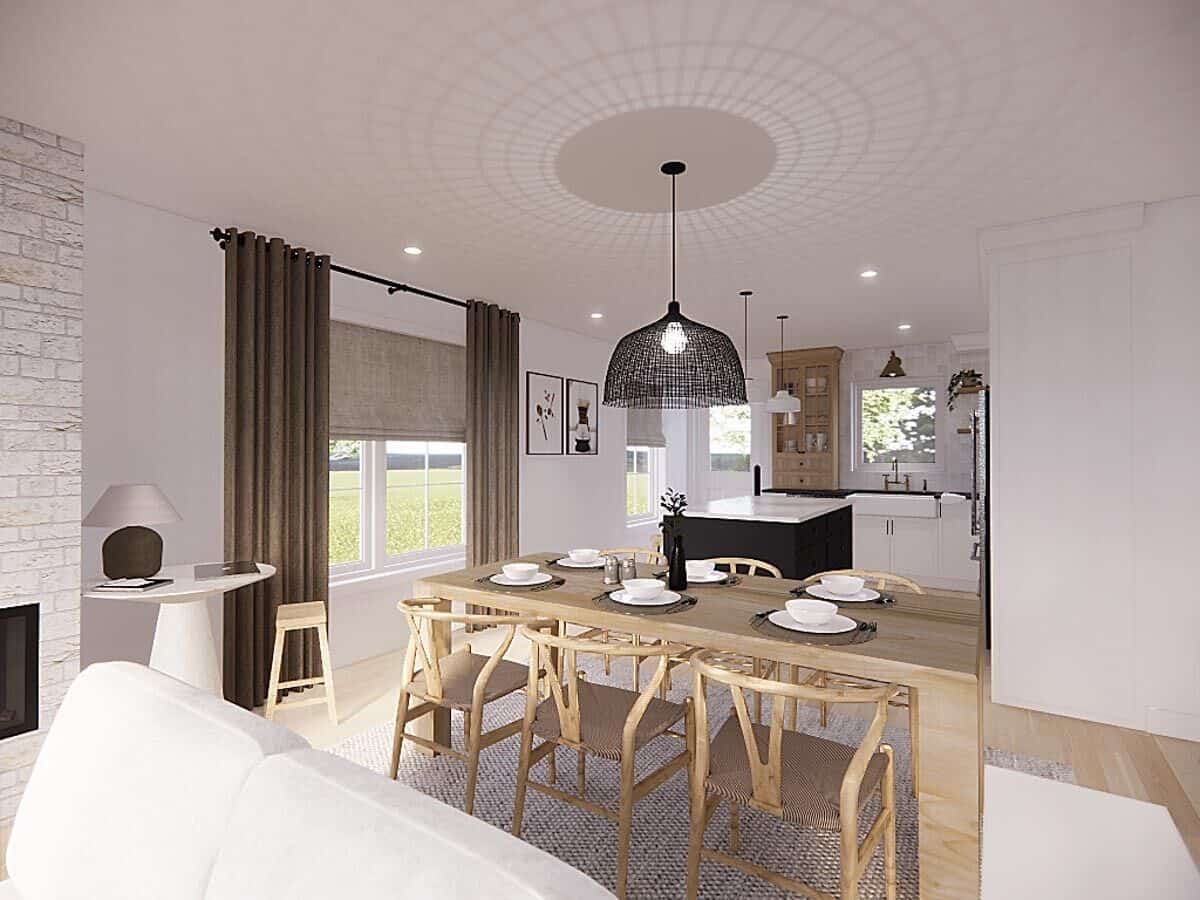A wrought iron pendant illuminates the dining area.