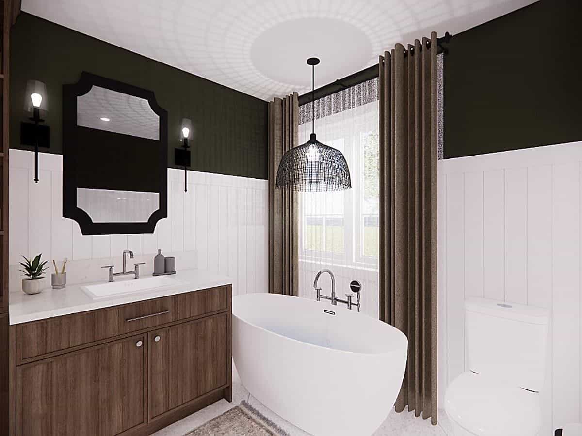 White-framed windows above the bathtub brighten the bathroom.